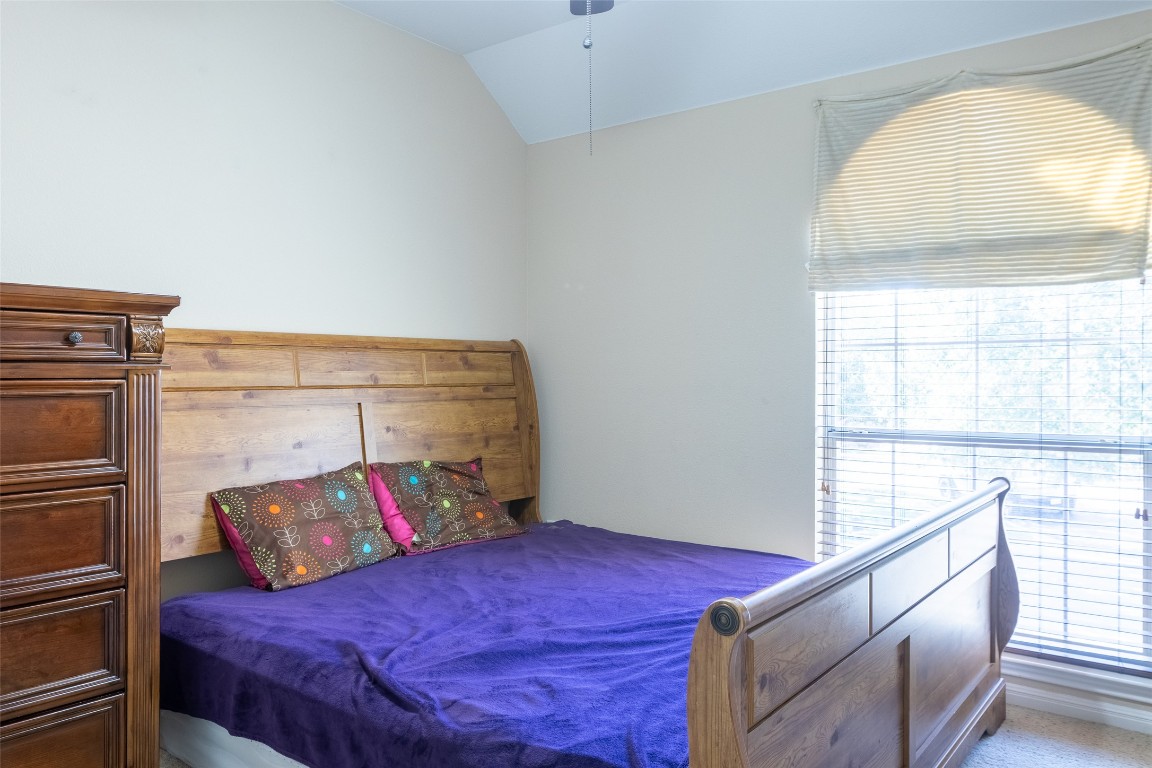 3113 Quail Run Round Rock, TX 78681 - Photo 26 of 29 Bedroom with vaulted ceiling
