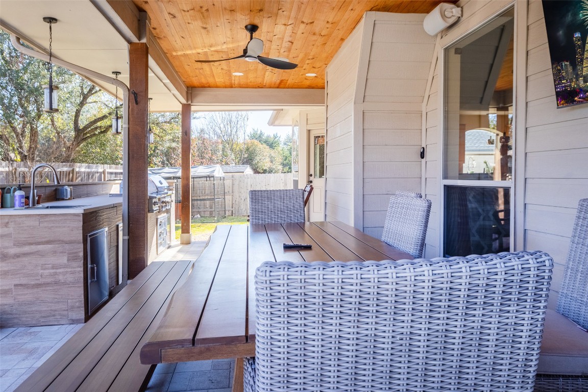 3113 Quail Run Round Rock, TX 78681 - Photo 7 of 29 Wooden terrace with room enough for an outdoor dining area and an outdoor kitchen
