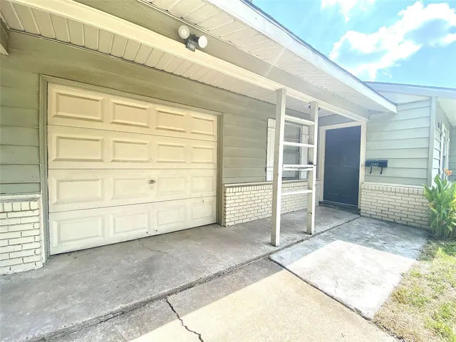 a view of a house with garage