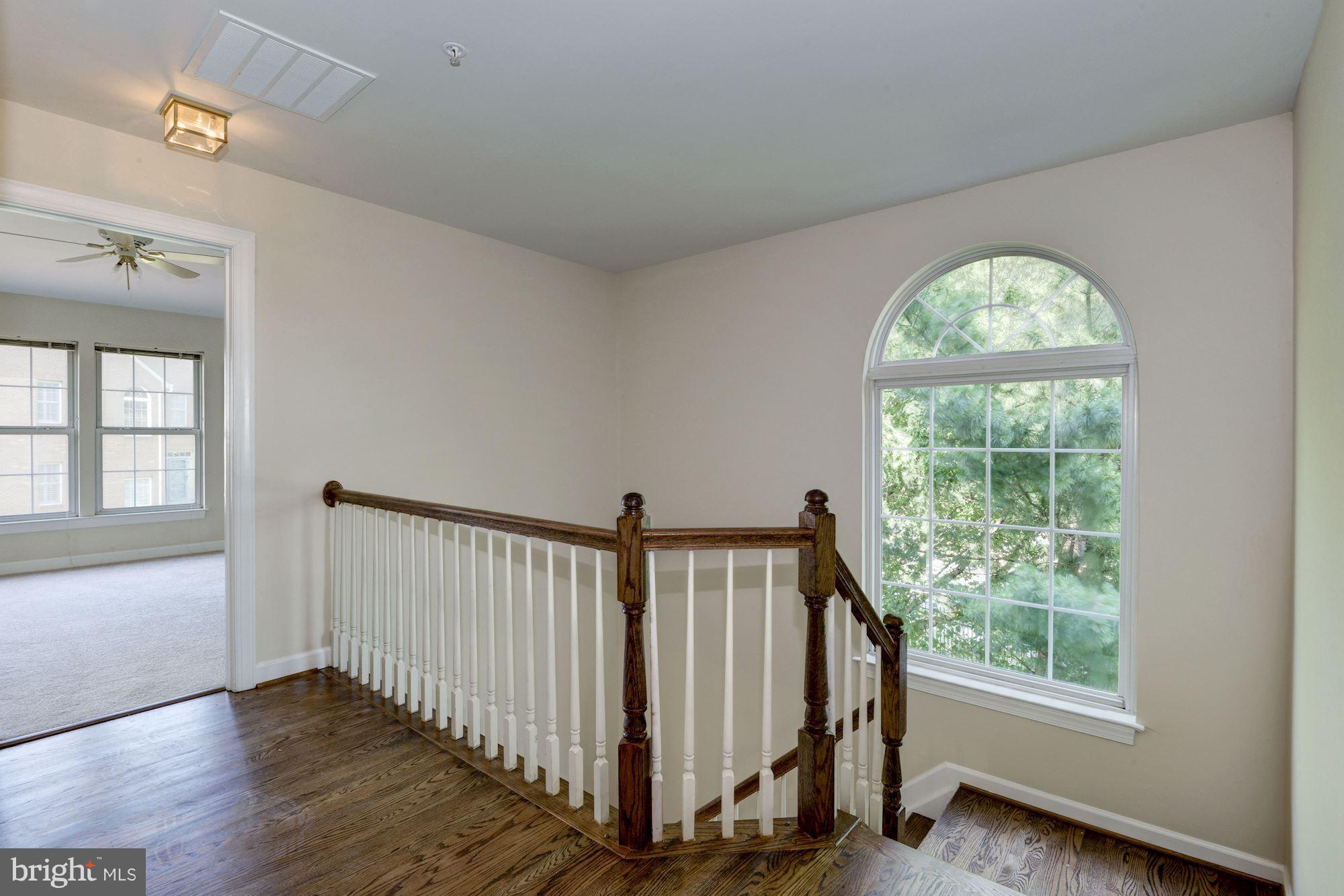 2101 Hounds Run Place Silver Spring, MD 20906 - Photo 16 of 30 a view of an entryway with wooden floor