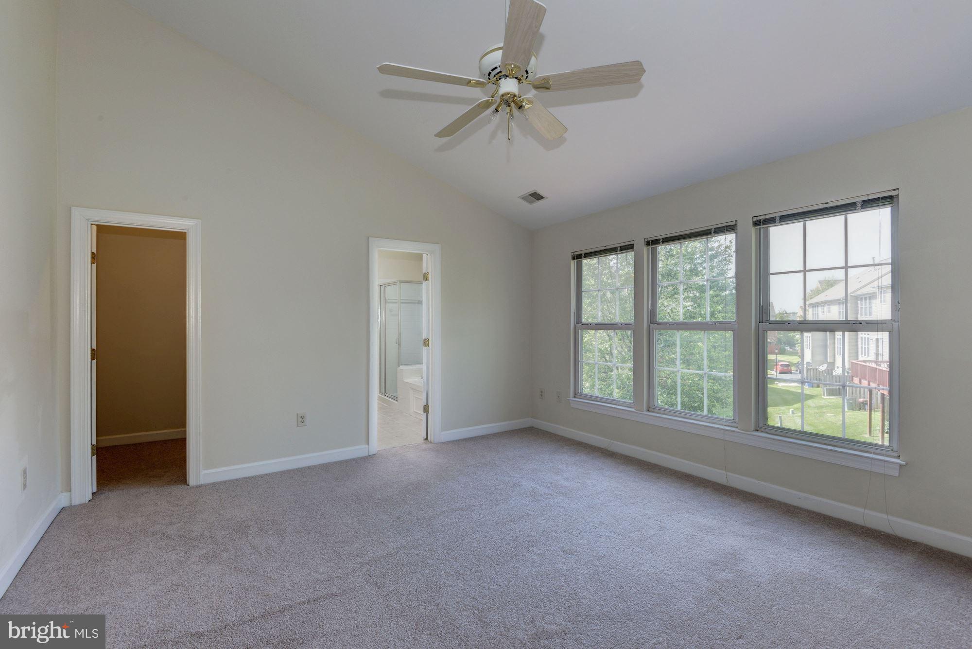 2101 Hounds Run Place Silver Spring, MD 20906 - Photo 17 of 30 a view of an empty room with a window