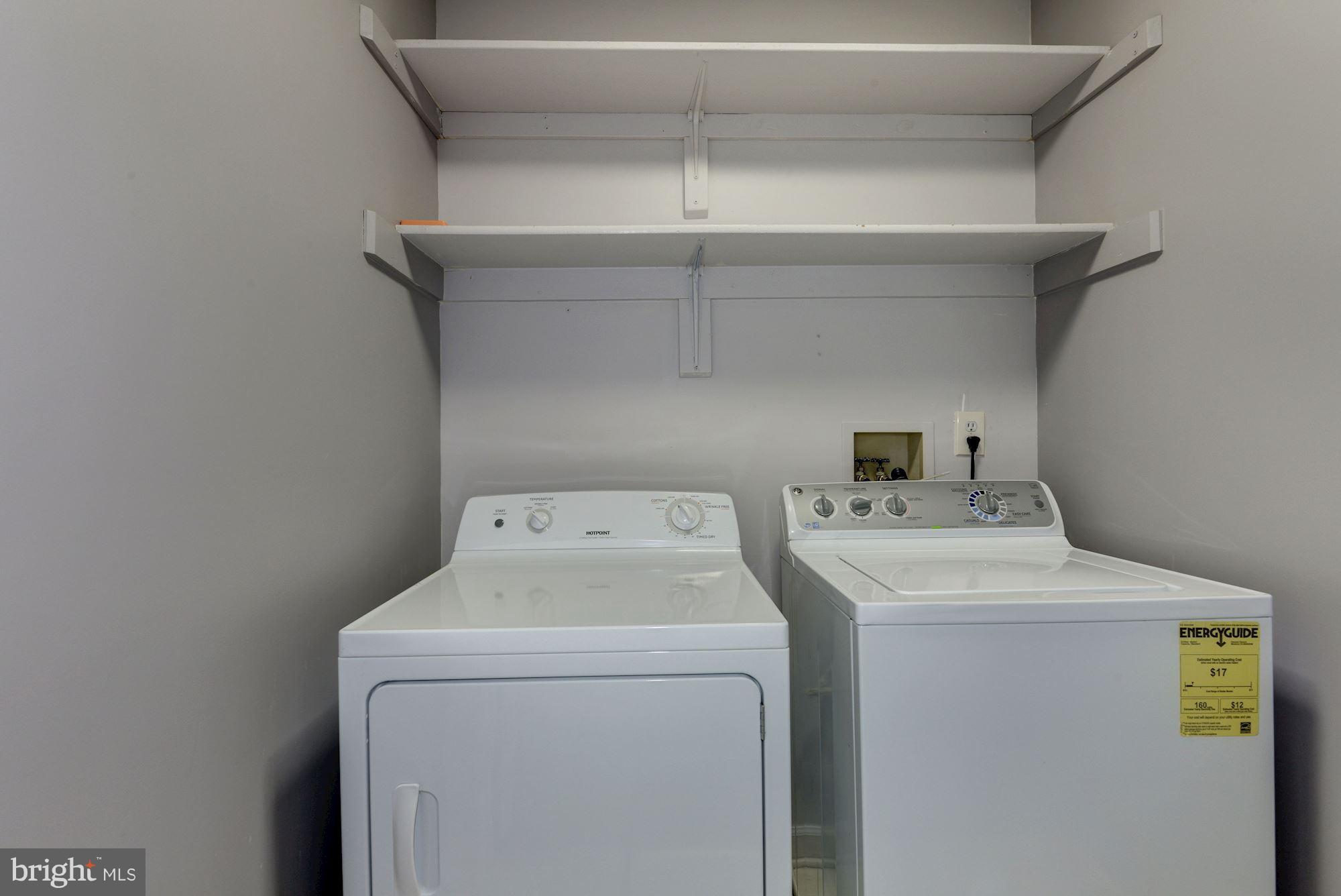 2101 Hounds Run Place Silver Spring, MD 20906 - Photo 25 of 30 a utility room with dryer and washer