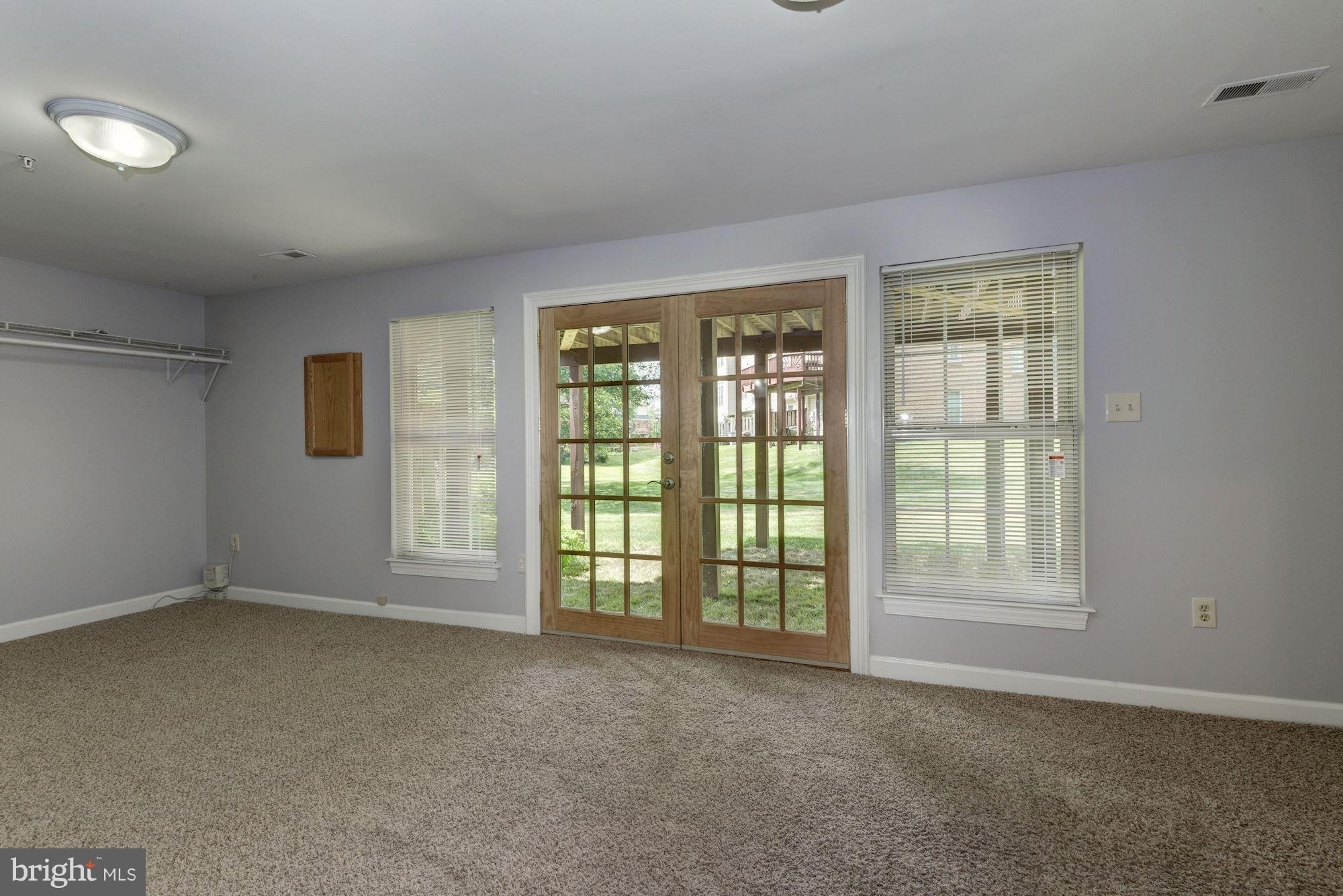2101 Hounds Run Place Silver Spring, MD 20906 - Photo 26 of 30 a view of an empty room with a window