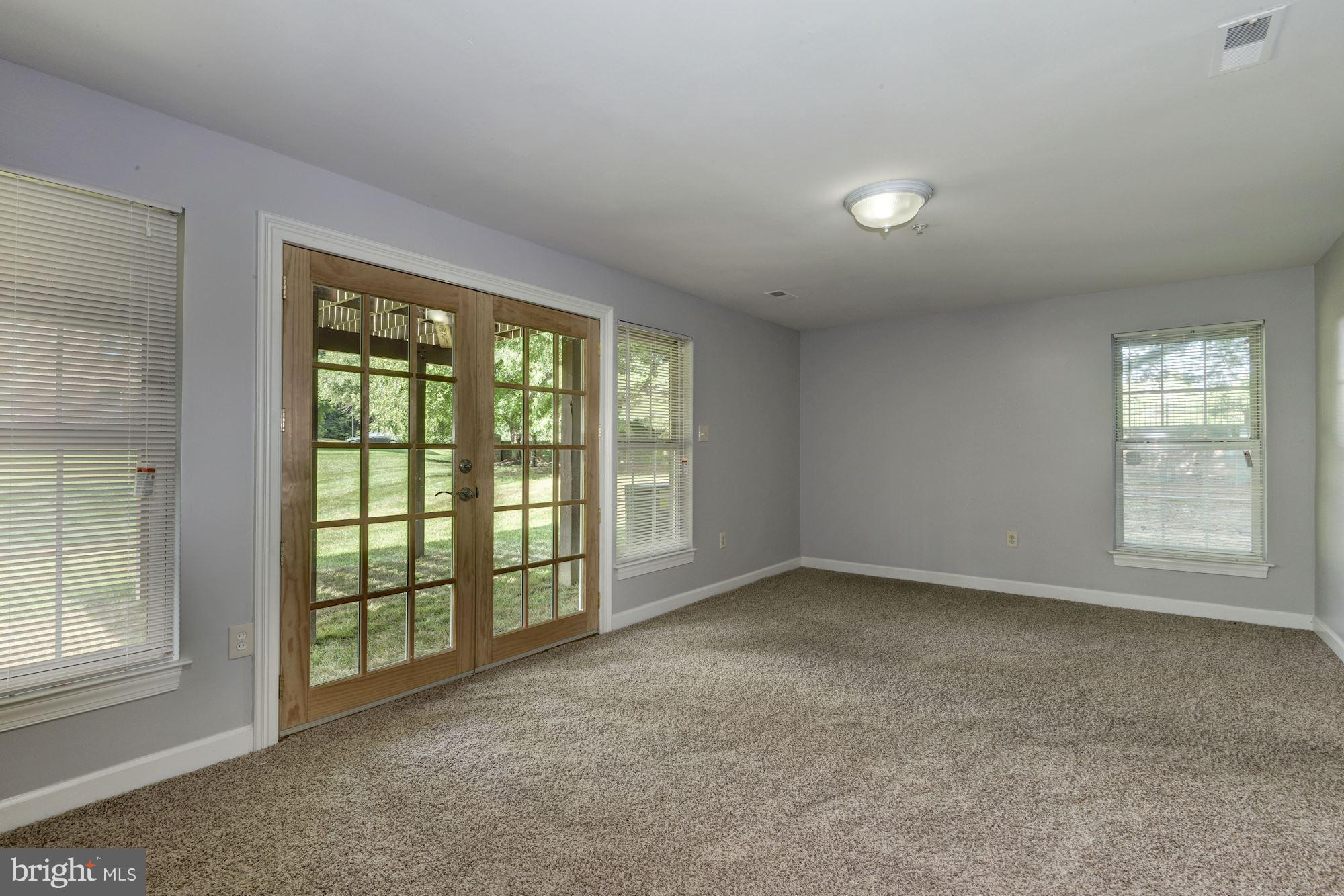 2101 Hounds Run Place Silver Spring, MD 20906 - Photo 27 of 30 an empty room with windows