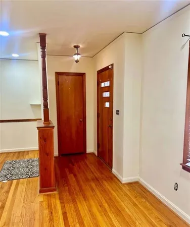 a kitchen with granite countertop a stove and a sink
