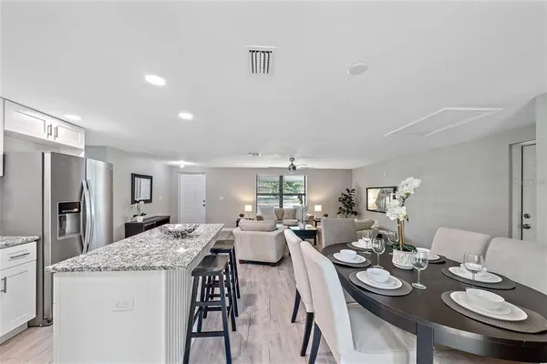 a view of a dining room with furniture