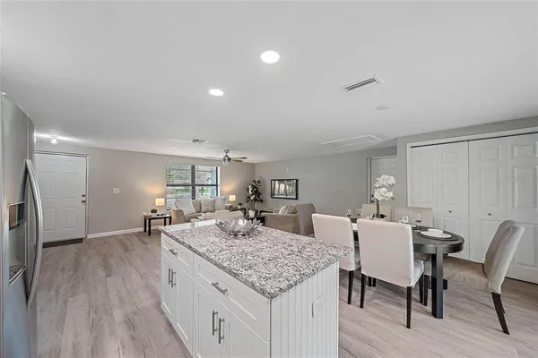 a view of a dining room with furniture
