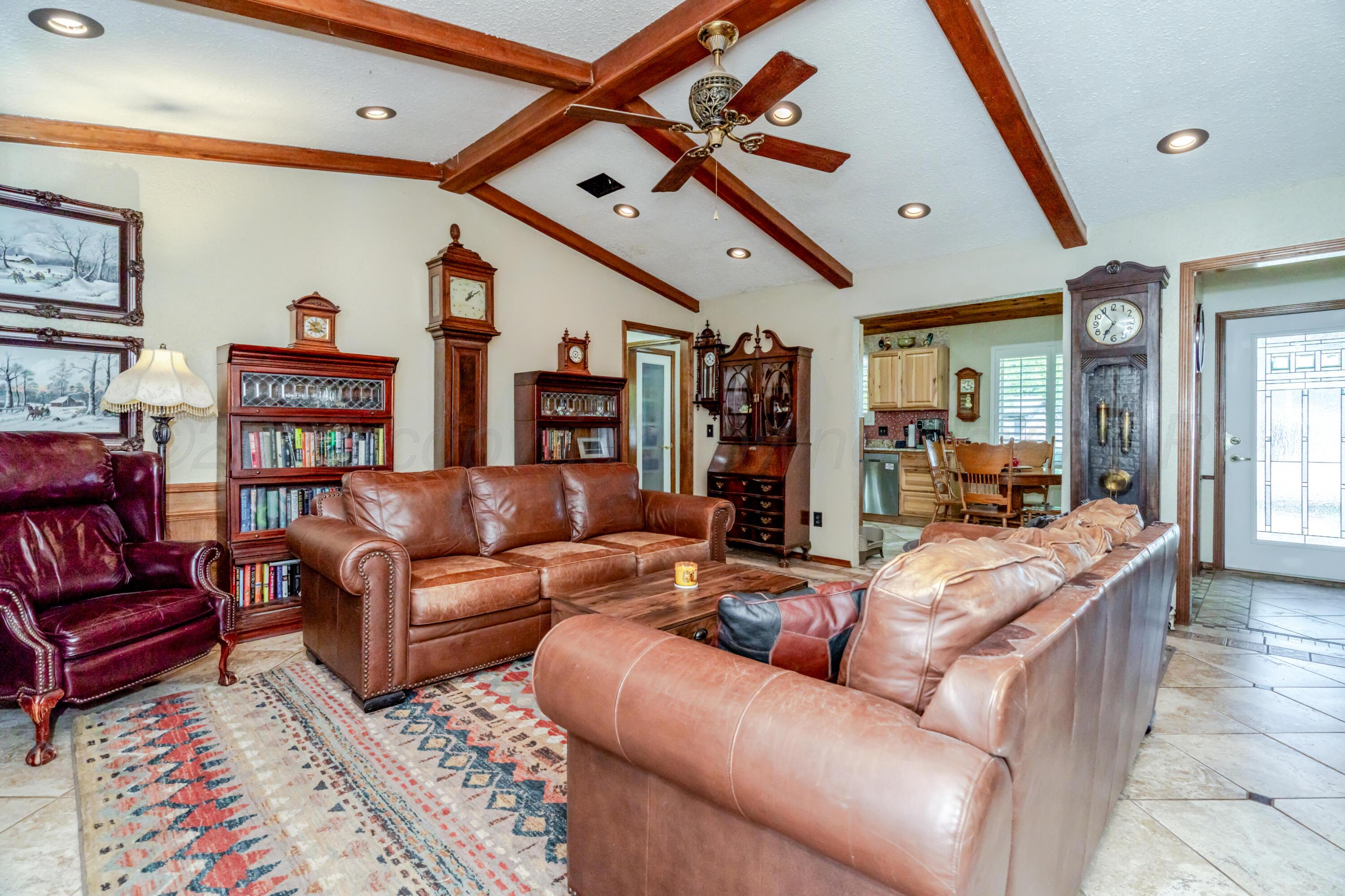 3908 Lewis Drive Amarillo, TX 79109 - Photo 13 of 36 a living room with furniture and a large window