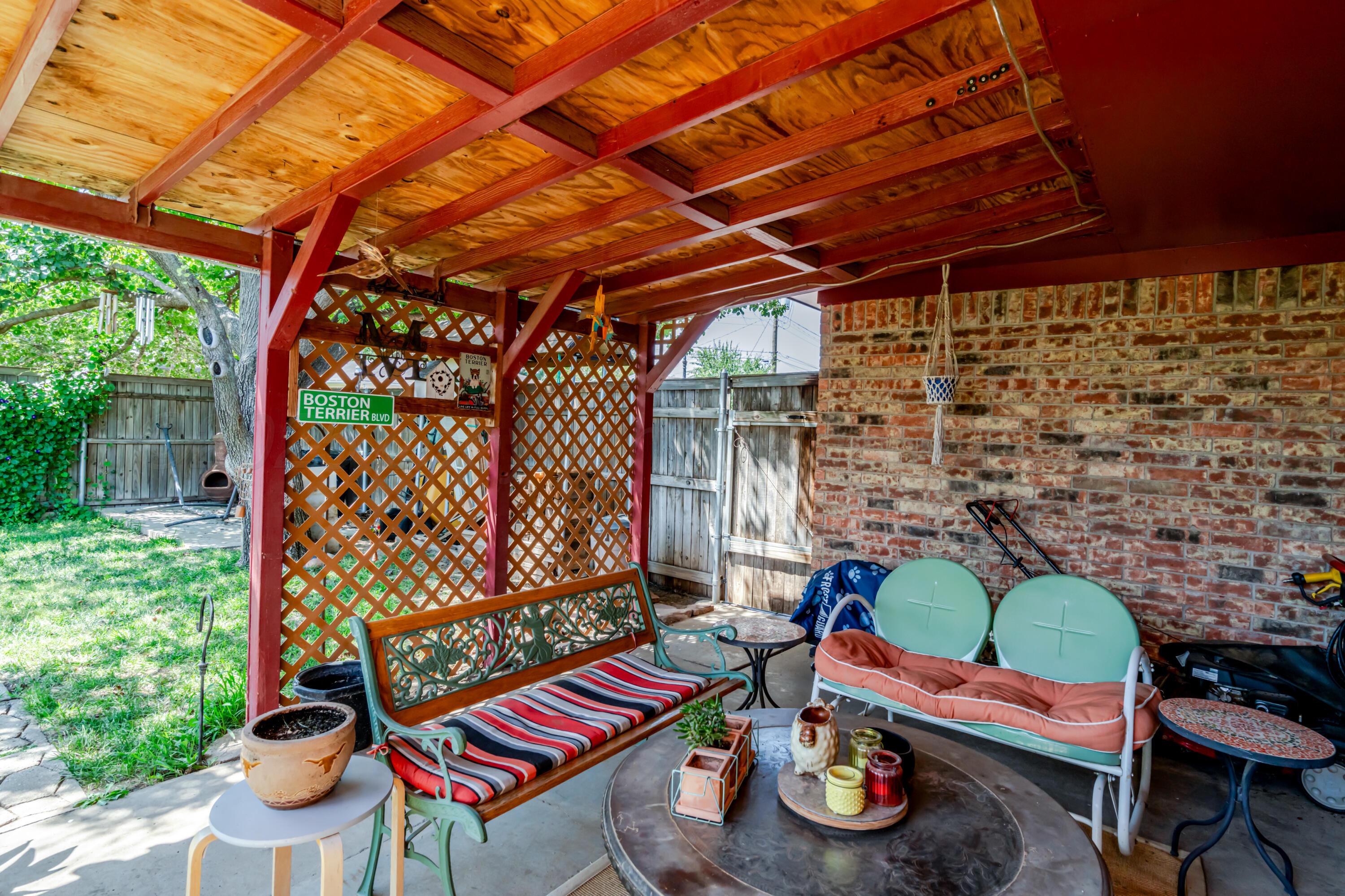3908 Lewis Drive Amarillo, TX 79109 - Photo 28 of 36 a car parked in front of a wooden house
