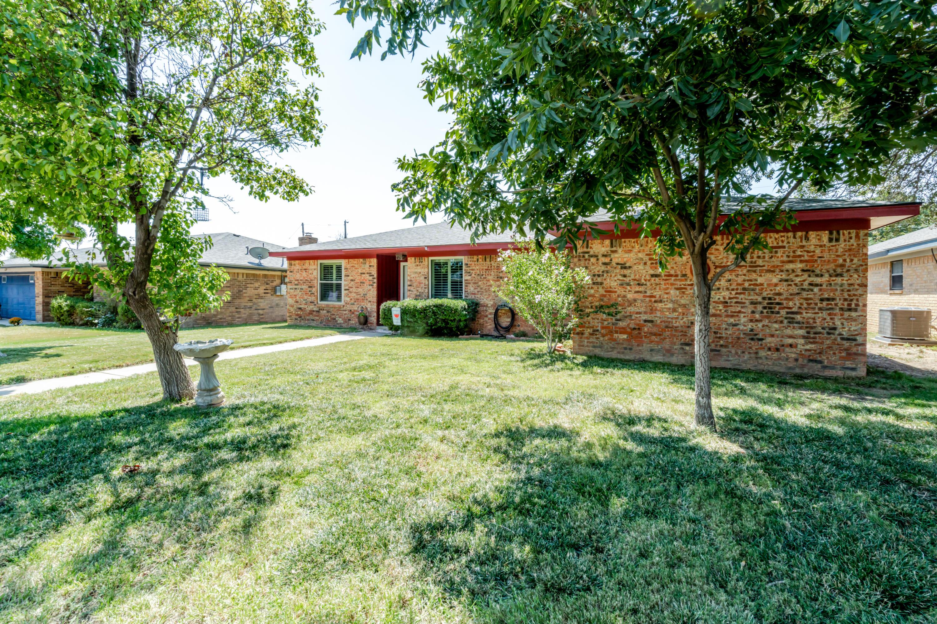 3908 Lewis Drive Amarillo, TX 79109 - Photo 35 of 36 a house view with a garden space