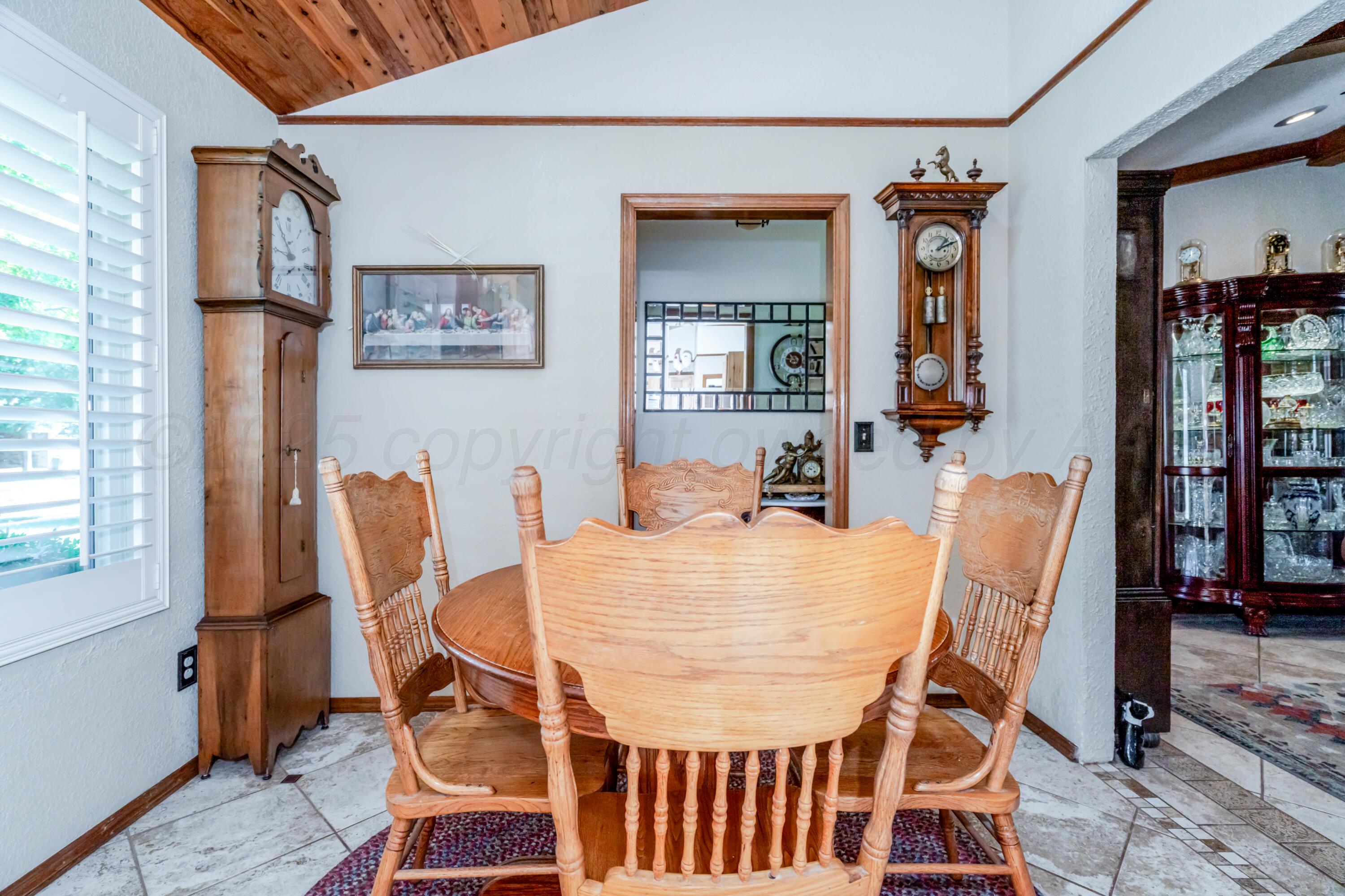 3908 Lewis Drive Amarillo, TX 79109 - Photo 10 of 36 a view of a dining room with furniture