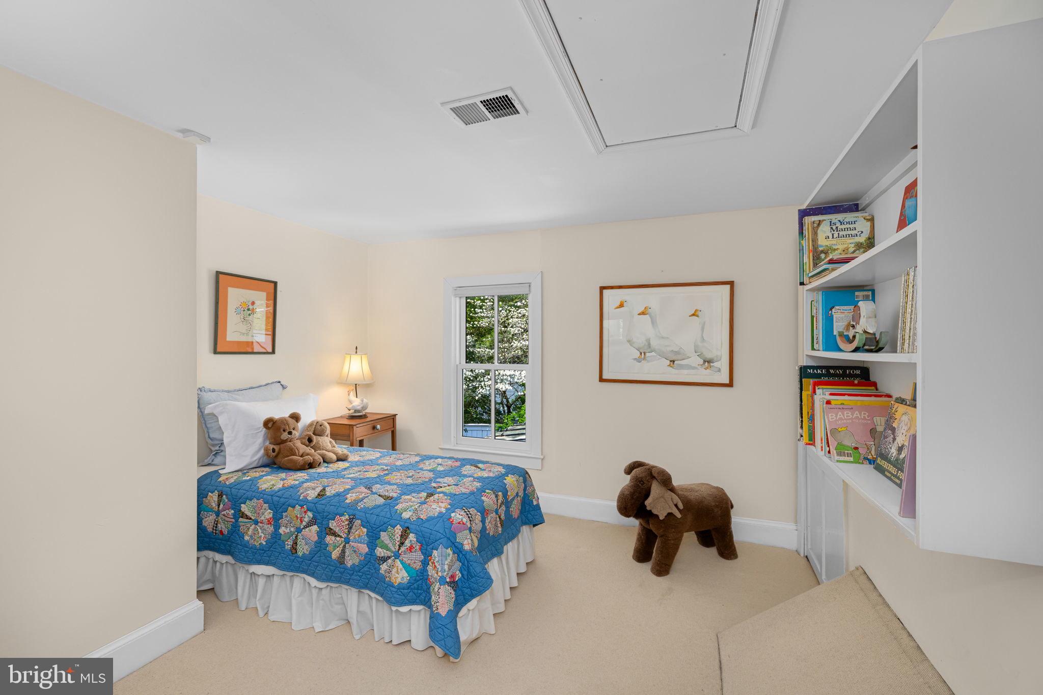 6139 Franklin Park Road McLean, VA 22101 - Photo 21 of 49 a bedroom with a bed and a couch