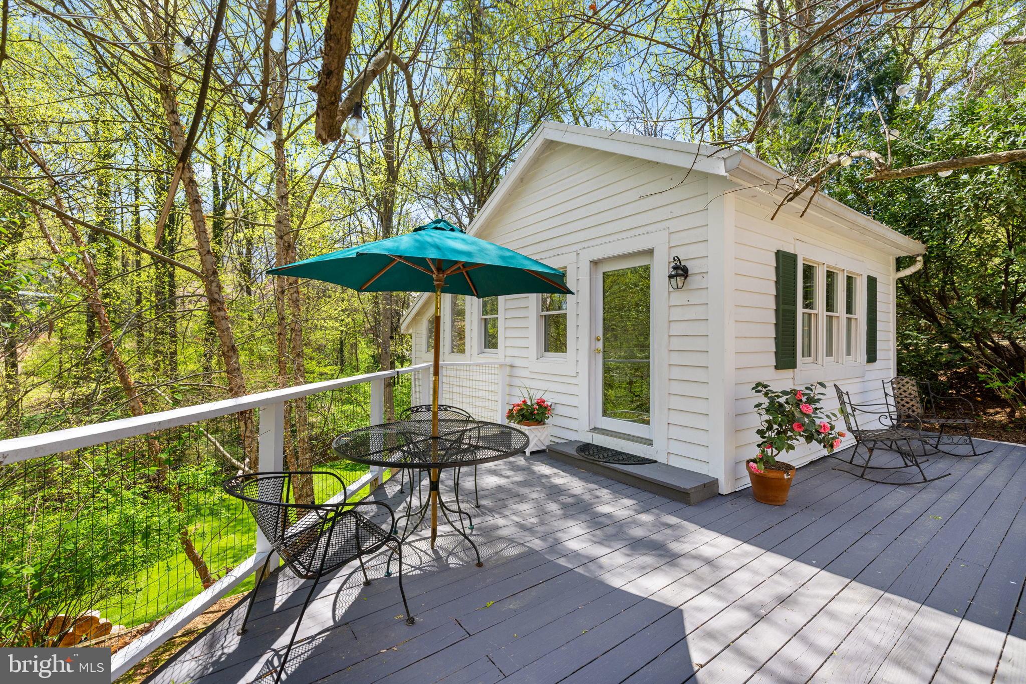 6139 Franklin Park Road McLean, VA 22101 - Photo 30 of 49 a patio with wooden table and chairs