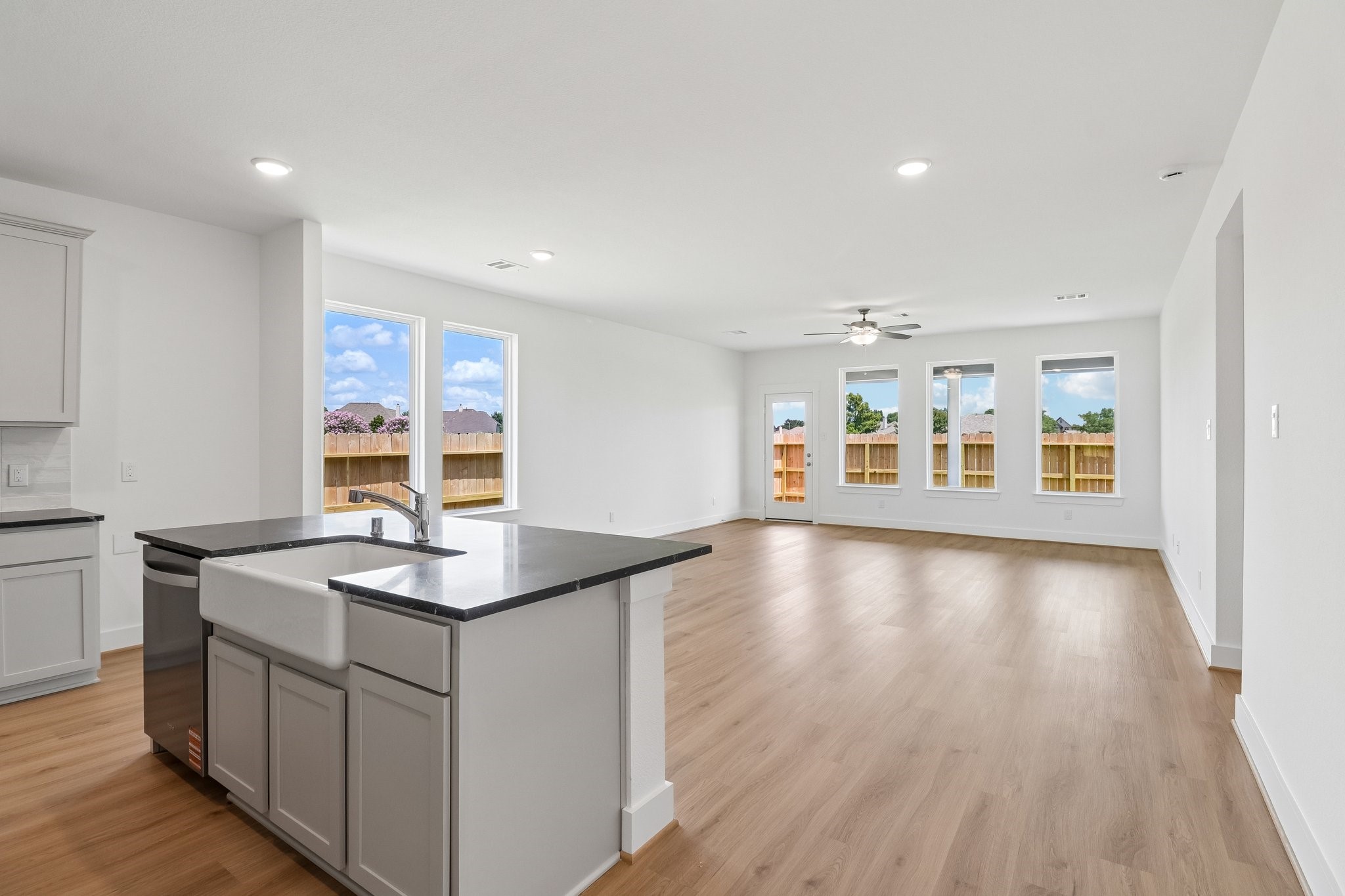 5314 Grace Sunshine Spring Spring, TX 77379 - Photo 1 of 27 Large windows offer breathtaking views of the surrounding landscape, creating a backdrop that changes with the seasons and fills your home with warmth.