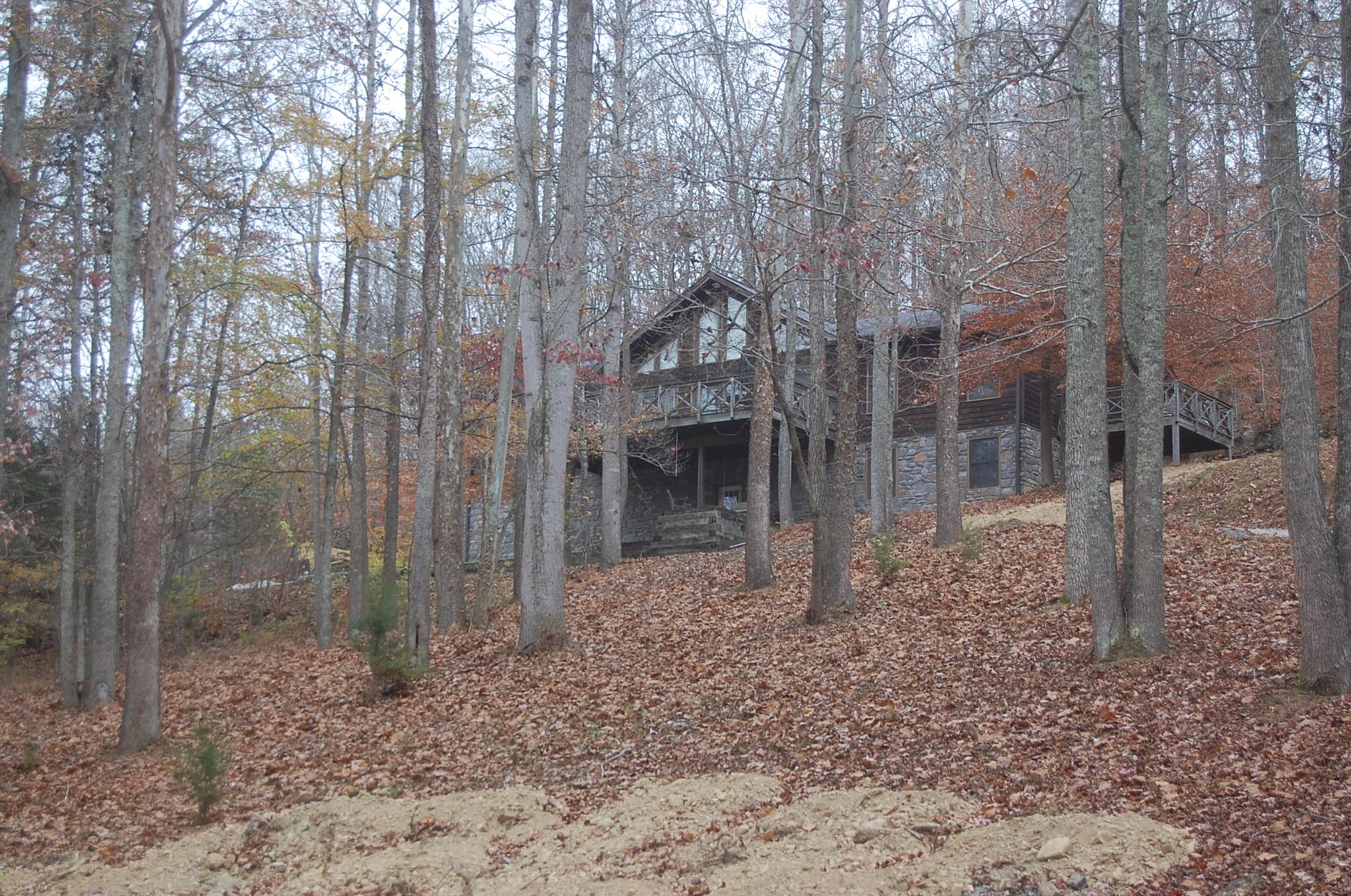 8765 Griffith Road Nashville, TN 37221 - Photo 1 of 27 This home sits high on the hill with a view that feels like the mountains.