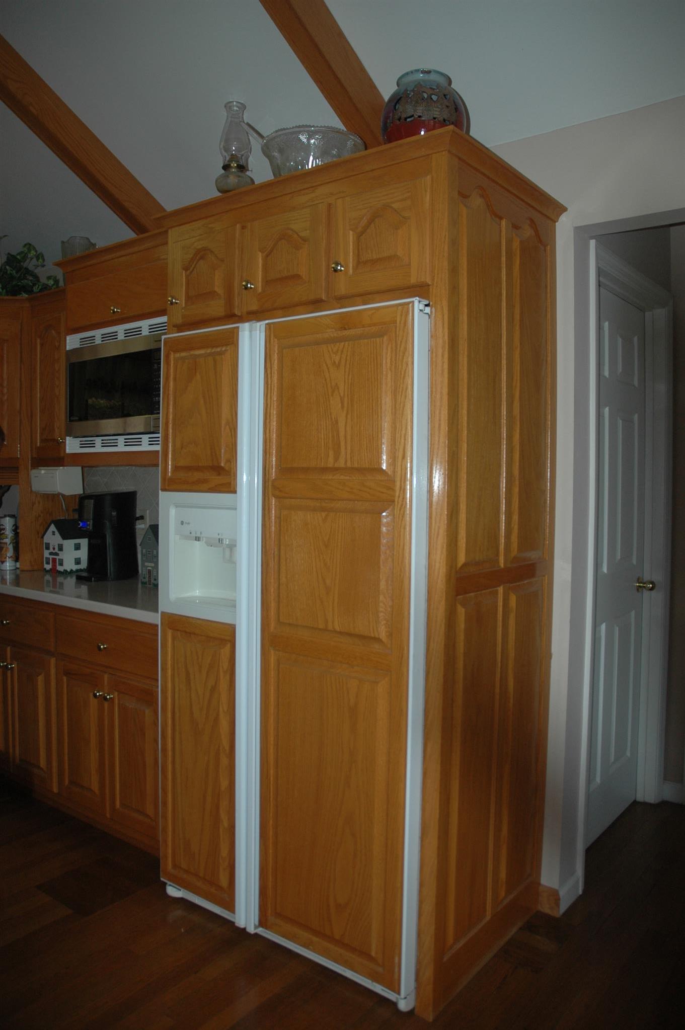 8765 Griffith Road Nashville, TN 37221 - Photo 17 of 27 Built in fridge with custom made panels