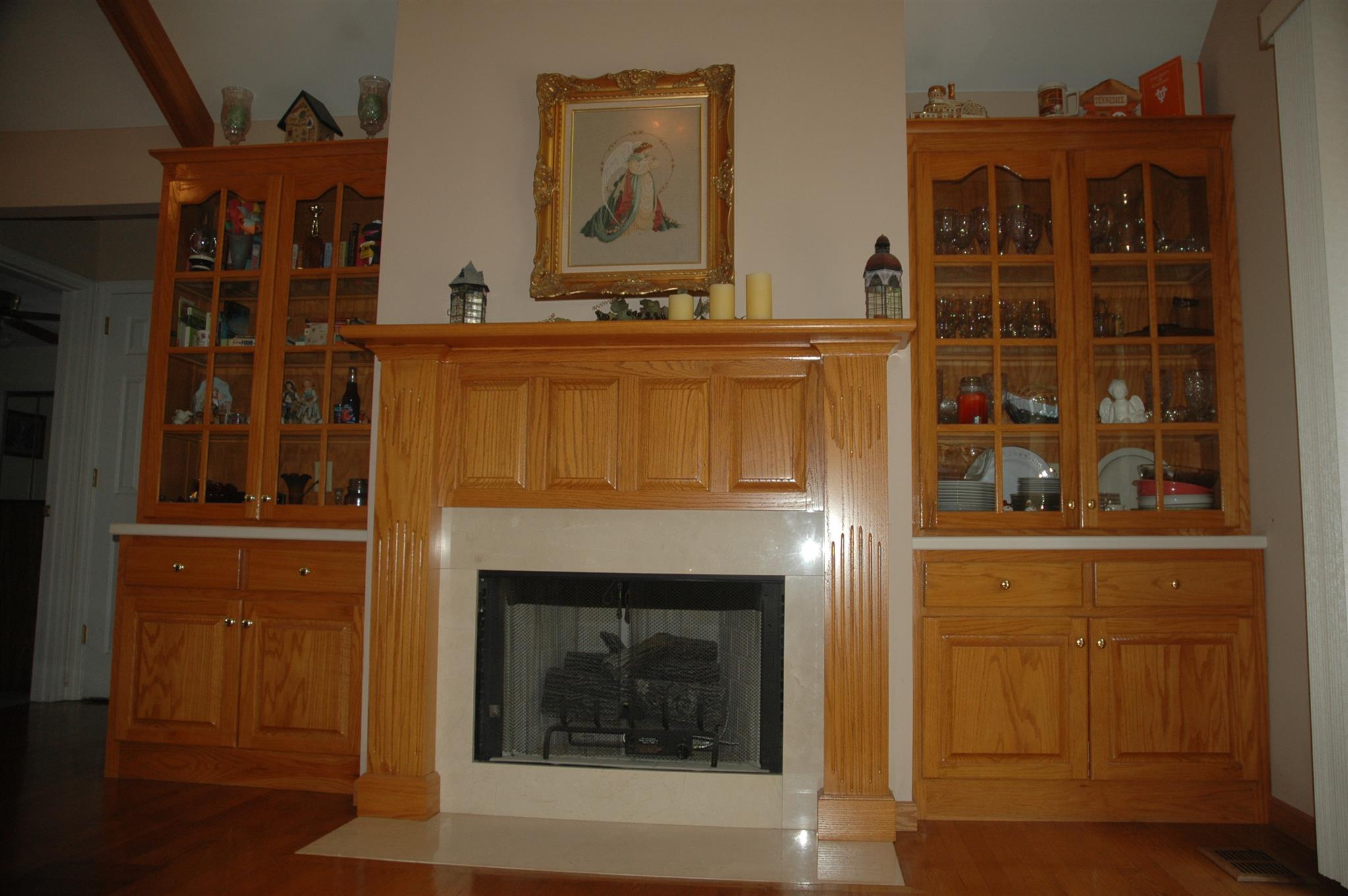 8765 Griffith Road Nashville, TN 37221 - Photo 20 of 27 Custom build mantel with built in bookcases