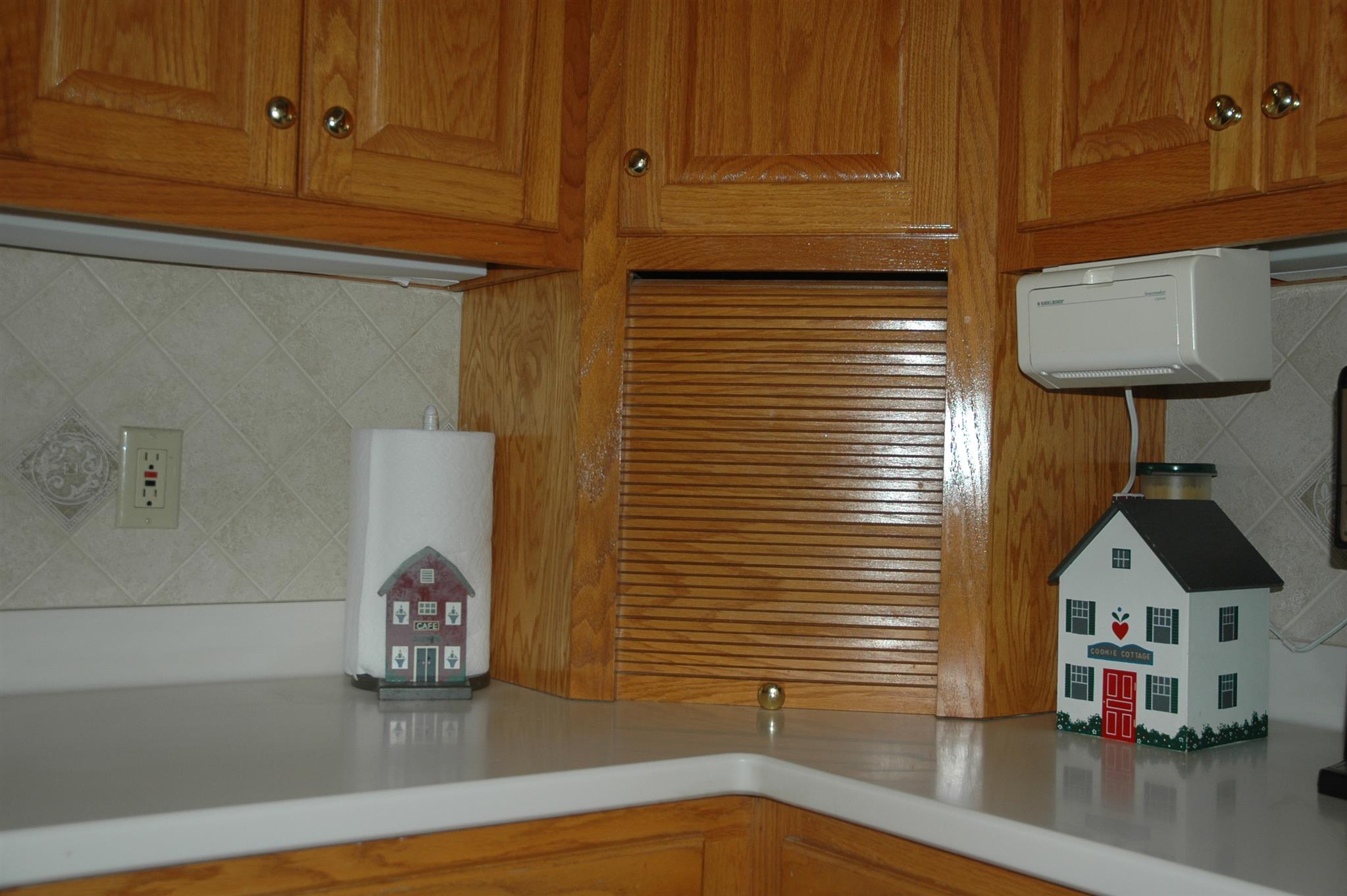 8765 Griffith Road Nashville, TN 37221 - Photo 5 of 27 This appliance garage is so useful! Nice clean lines with Corian tops and ceramic tile backsplash