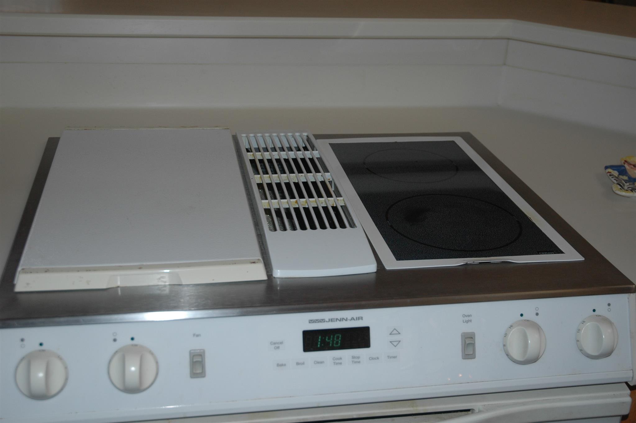 8765 Griffith Road Nashville, TN 37221 - Photo 6 of 27 Jenn Air cook top with downdraft in the island