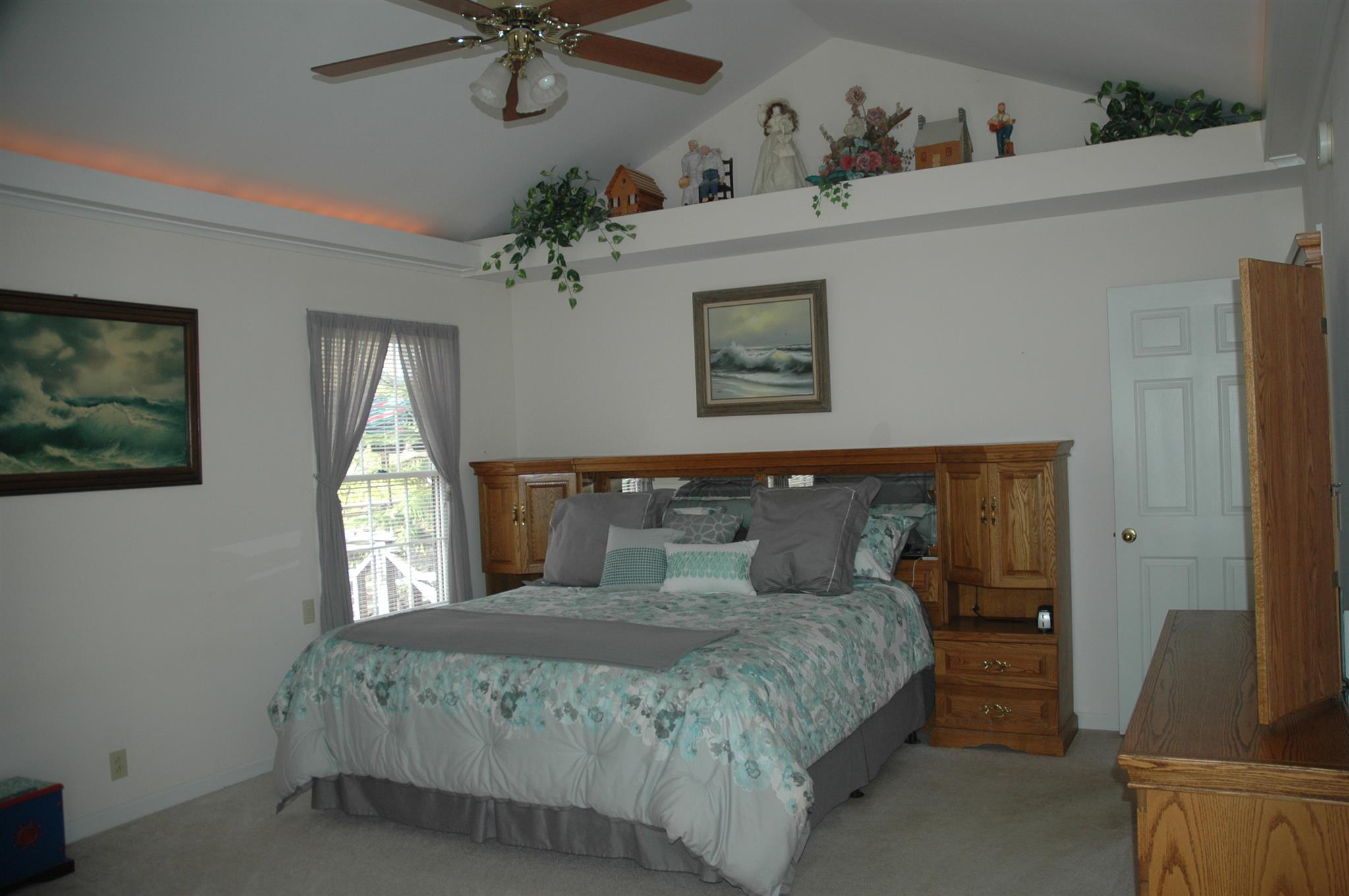 8765 Griffith Road Nashville, TN 37221 - Photo 8 of 27 master bedroom showing the plant shelf above