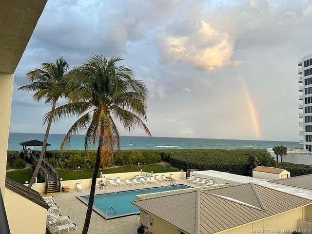 a view of a sign board with street
