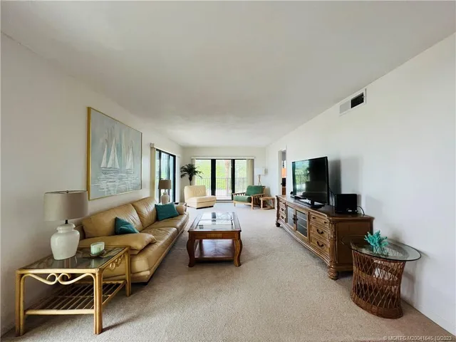 a view of balcony with wooden floor