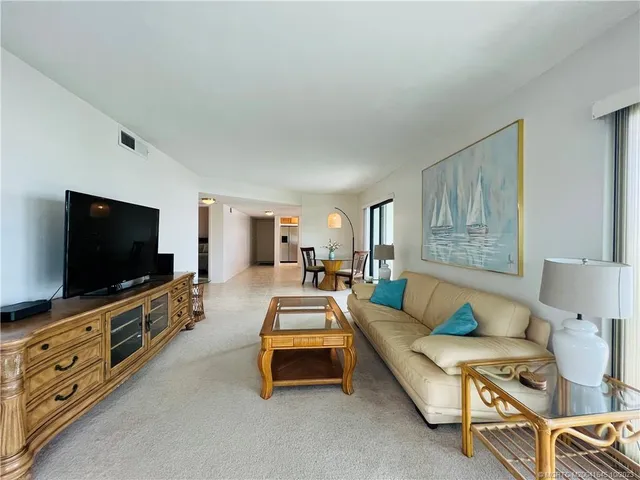 an ocean view with palm trees