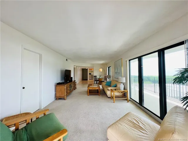 a bed room with a bed and a dresser