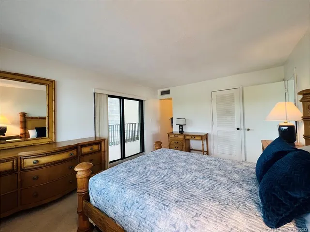 a kitchen with a sink and a stove top oven