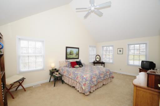 2706 Rondi Court Spring Grove, IL 60081 - Photo 13 of 14 a bedroom with a bed and wooden floor