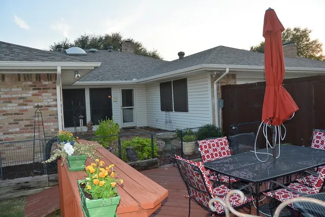 a backyard of a house with seating space