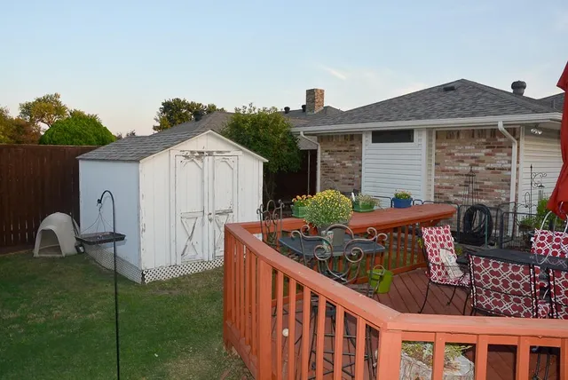 a front view of house with yard and seating area