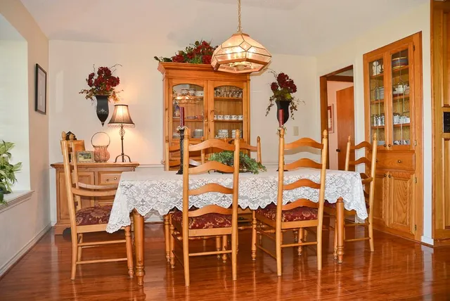 a view of living room with wooden floor