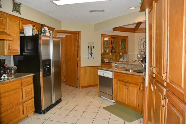 a bathroom with a sink a mirror and a bathtub