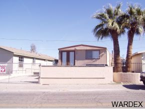 10067 Rio Vista Road Parker, AZ 85344 - Photo 1 of 10 a view of a living room and kitchen