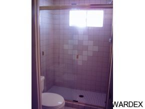 10067 Rio Vista Road Parker, AZ 85344 - Photo 6 of 10 a bathroom with a toilet and a shower