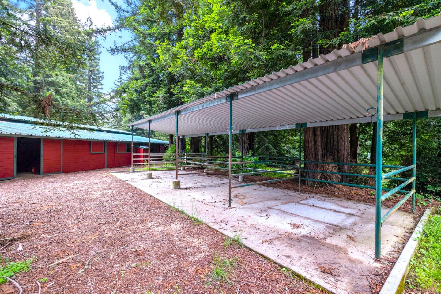 3675 Bonny Doon Road Santa Cruz, CA 95060 - Photo 23 of 59 a view of a house with backyard and sitting area