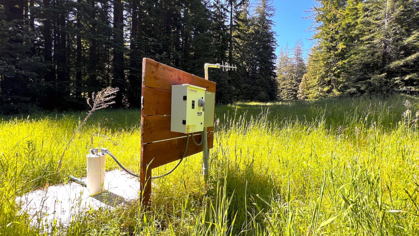 3675 Bonny Doon Road Santa Cruz, CA 95060 - Photo 35 of 59 a view of a lake from a yard