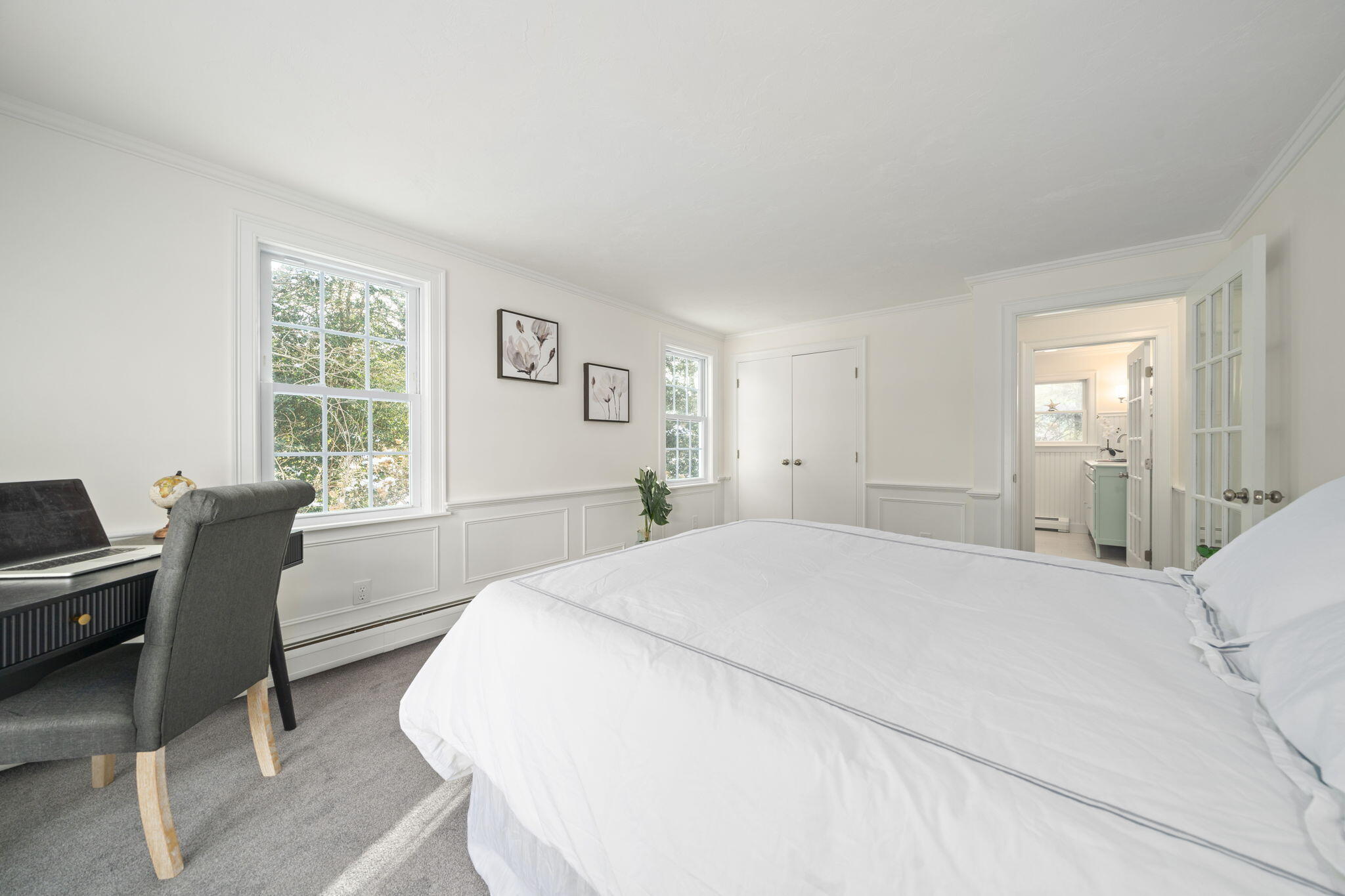 10 Sail -A-Way Barnstable, MA 02632 - Photo 12 of 32 a spacious bedroom with a bed and a couch