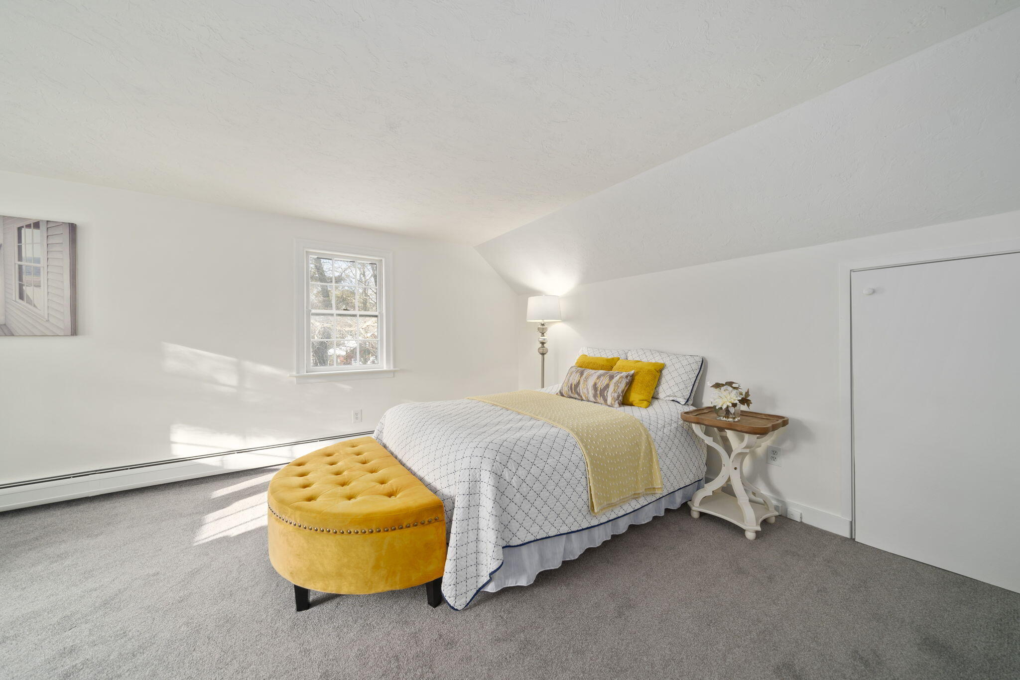 10 Sail -A-Way Barnstable, MA 02632 - Photo 15 of 32 a spacious bedroom with a bed and a window