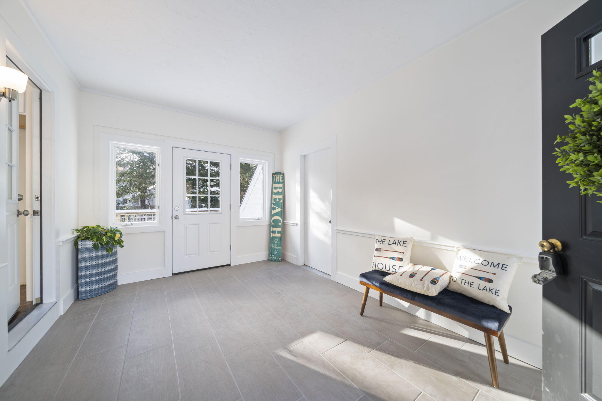 10 Sail -A-Way Barnstable, MA 02632 - Photo 2 of 32 a living room with furniture and windows