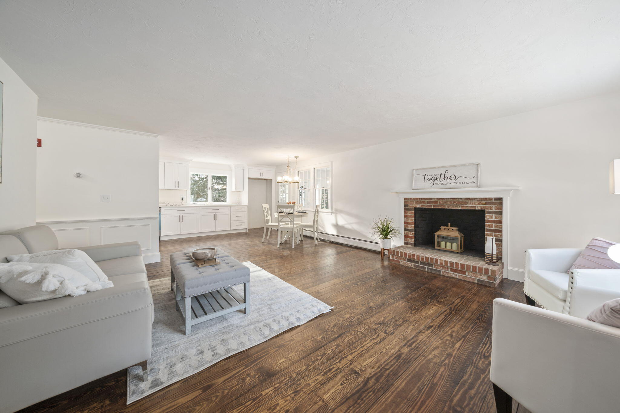 10 Sail -A-Way Barnstable, MA 02632 - Photo 9 of 32 a living room with furniture and a fireplace