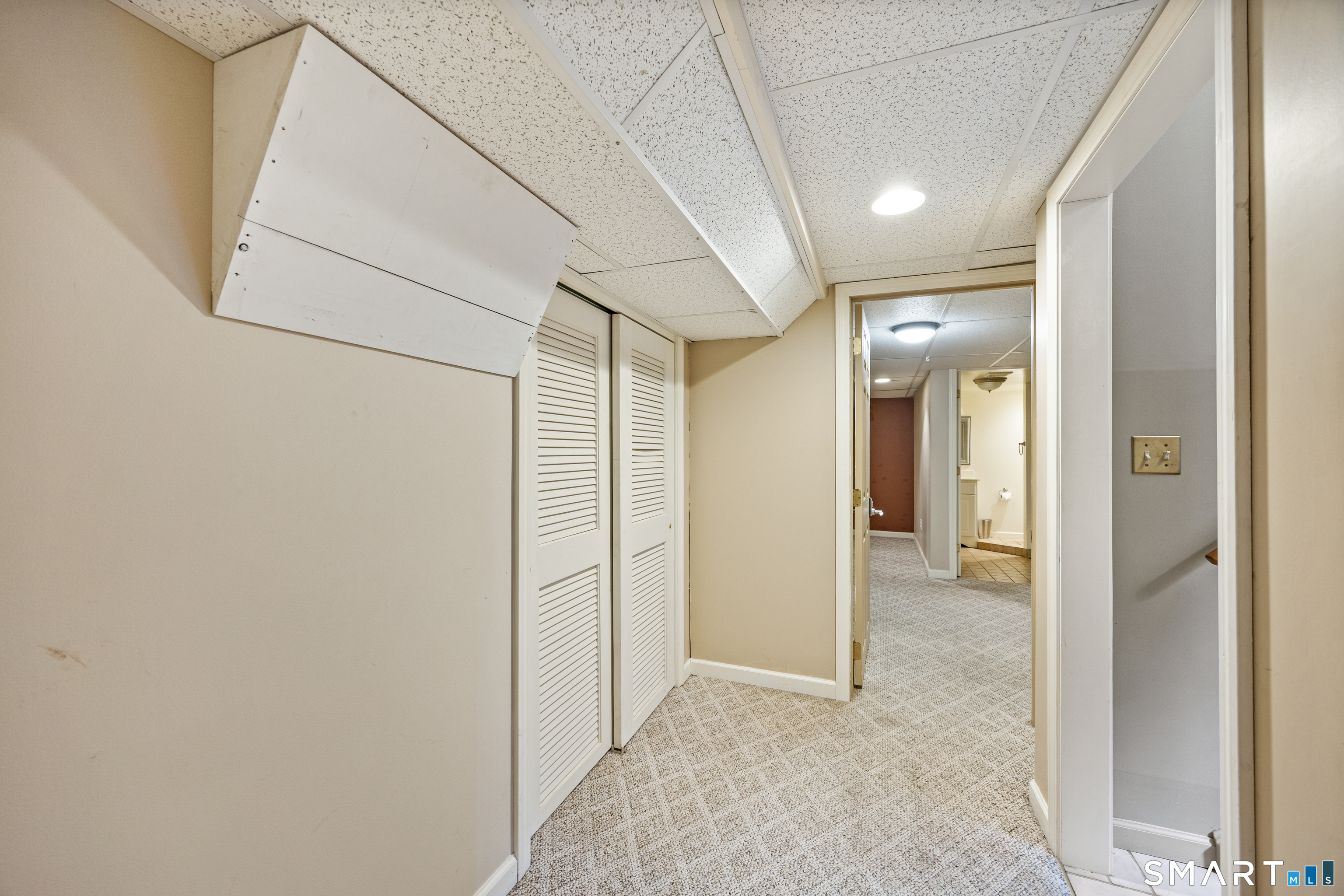 43 Quarry Village Road, Unit 43 Cheshire, CT 06410 - Photo 30 of 38 Hallway in lower level