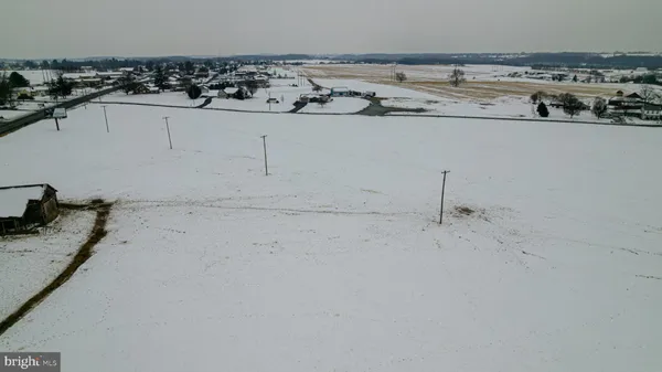 a view of a balcony with chairs
