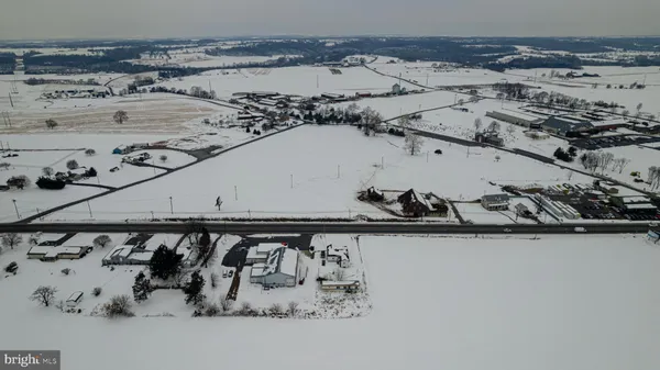 a roof deck with sitting area