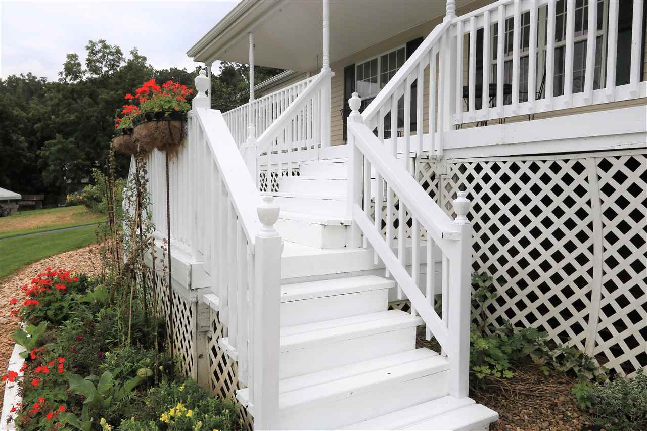 954 Quick's Mill Road Staunton, VA 24401 - Photo 13 of 45 a view of entryway with flower pots and wooden floor