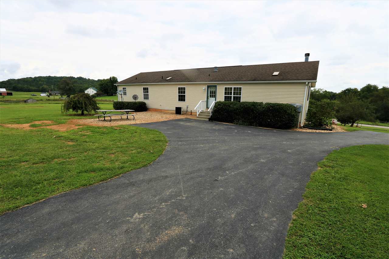 954 Quick's Mill Road Staunton, VA 24401 - Photo 15 of 45 a front view of a house with garden