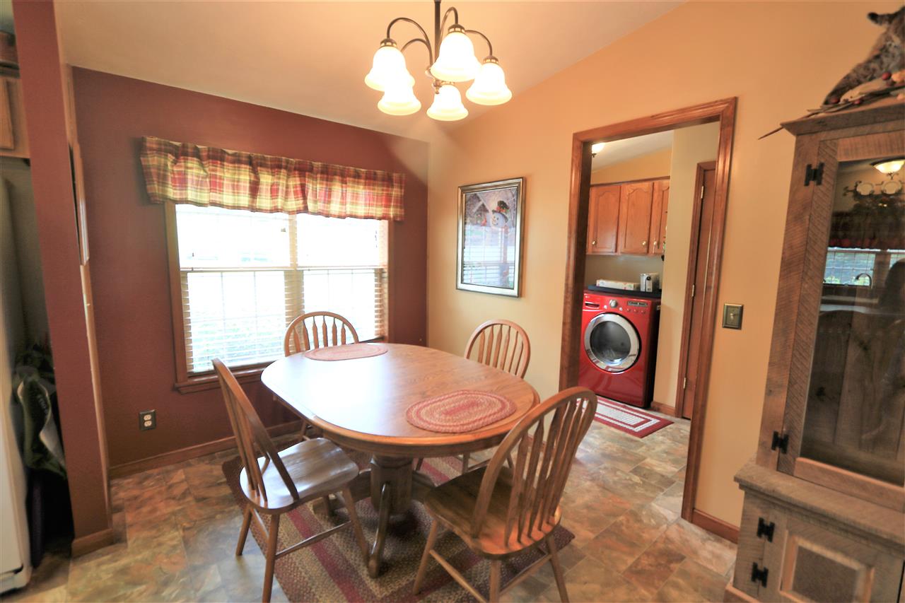 954 Quick's Mill Road Staunton, VA 24401 - Photo 20 of 45 a view of a dining room with furniture window and wooden floor