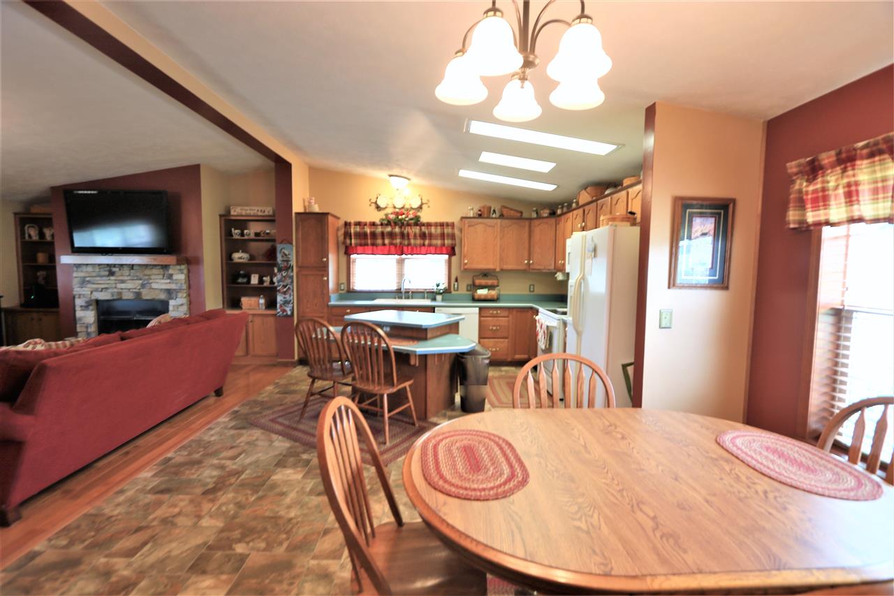 954 Quick's Mill Road Staunton, VA 24401 - Photo 21 of 45 a view of a dining room with furniture window and wooden floor