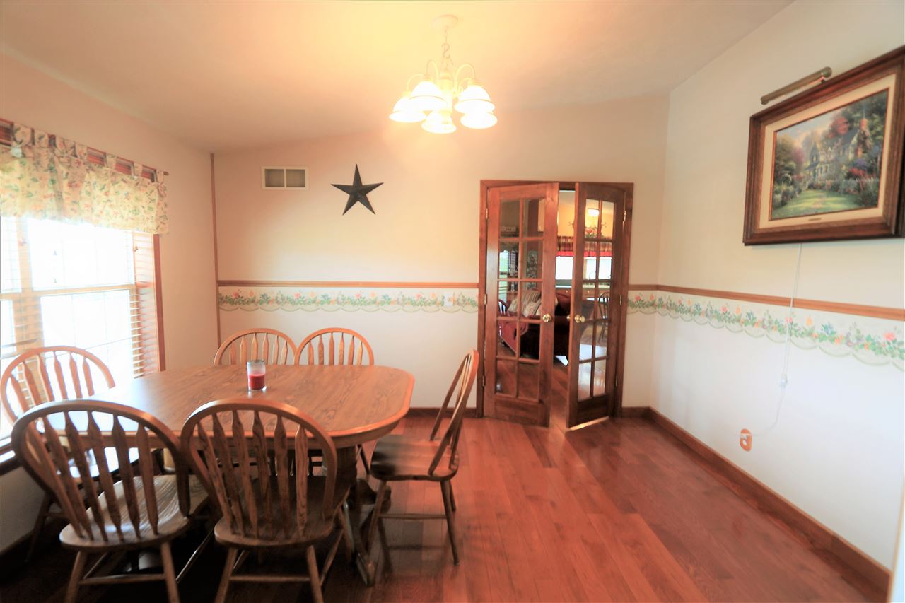 954 Quick's Mill Road Staunton, VA 24401 - Photo 31 of 45 a view of a dining room with furniture window and wooden floor